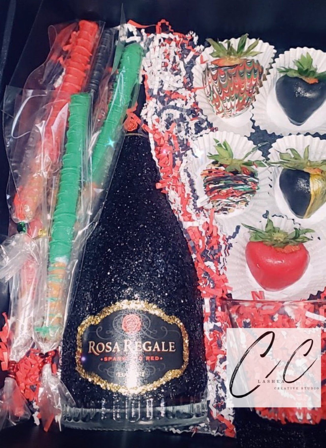Gift box with champagne bottle and chocolate dipped strawberries